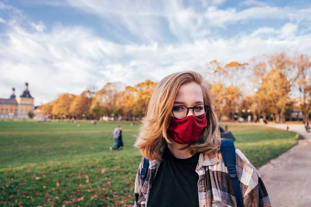 student with mask in corona times