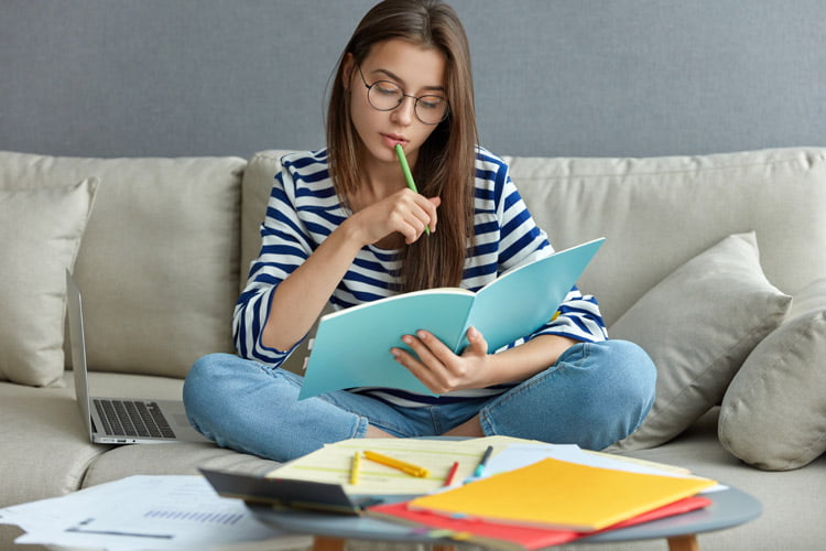 Woman looking at her papers