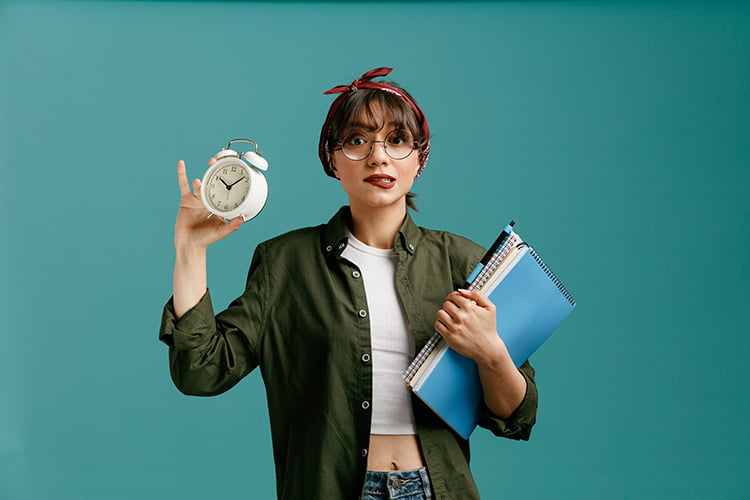 Picture shows woman with clock