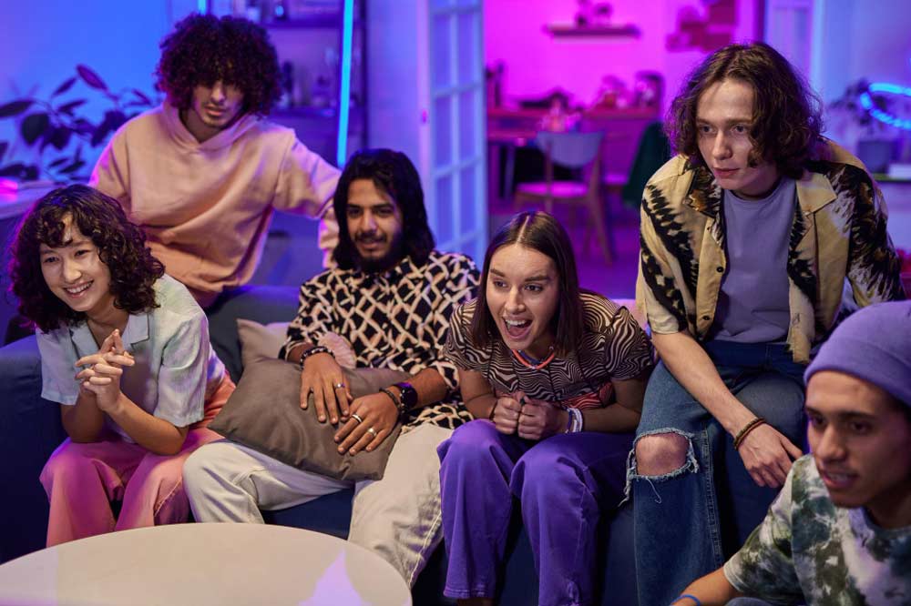 group of ppl in front of TV